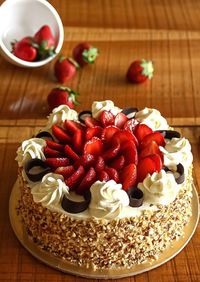 High angle view of strawberries in bowl on table