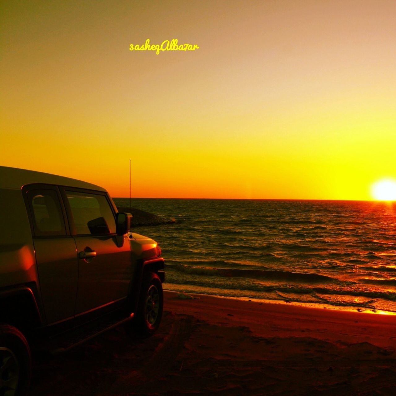 sunset, transportation, mode of transport, land vehicle, orange color, sun, sea, horizon over water, car, water, travel, scenics, beauty in nature, reflection, clear sky, copy space, tranquil scene, tranquility, on the move, yellow