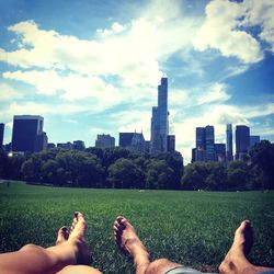 Low section of person relaxing in park