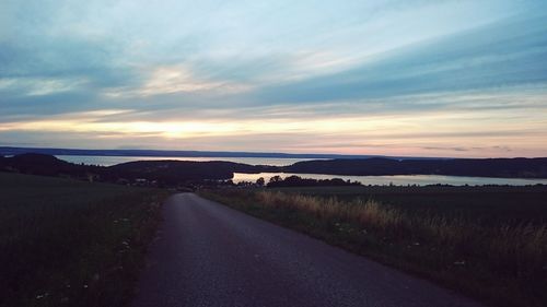 Empty road at sunset