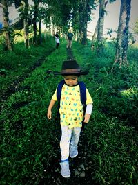 Full length of a girl wearing hat