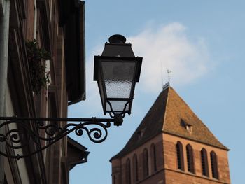 Low angle view of street light against sky