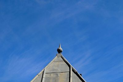 Low angle view of building against blue sky