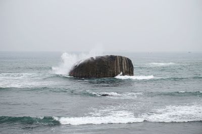 Scenic view of sea against clear sky