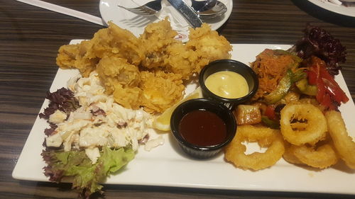 Close-up of food served on table