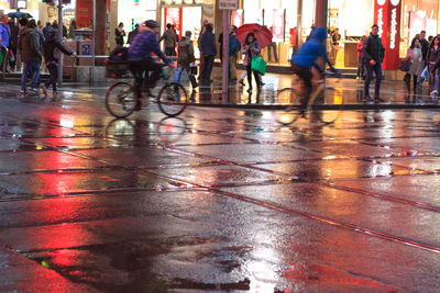 People walking on city street