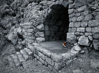 High angle view of man on cobblestone