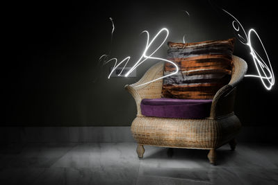 Close-up of empty chairs on table at home