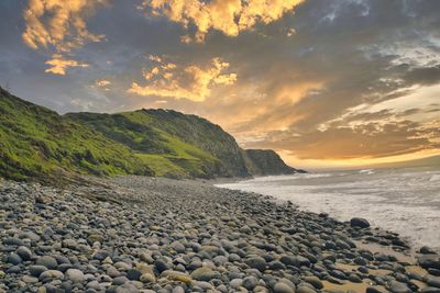 Rocky beach in sunset