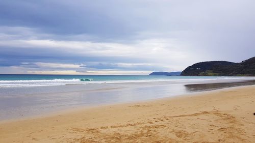 Scenic view of beach against sky