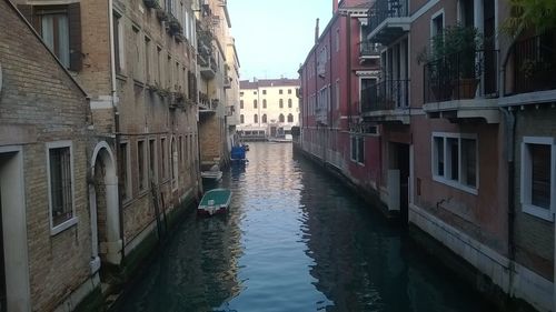 View of canal along buildings