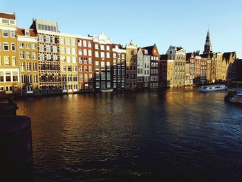 Buildings in city against sky