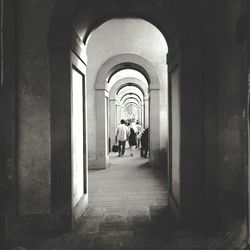 Full length of woman walking in corridor