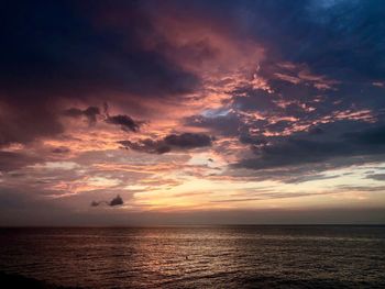 Scenic view of seascape against sky during sunset