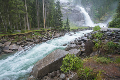 Scenic view of waterfall in forest