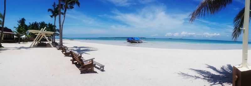 Benches on empty beach