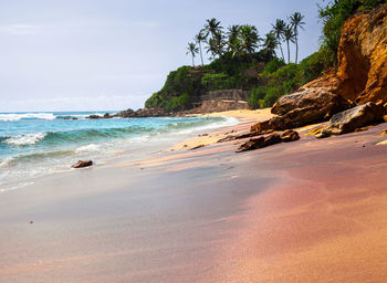 Multi coloured sands of weligama beach.