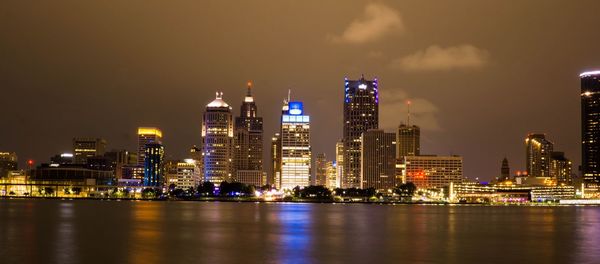 Illuminated buildings in city at night