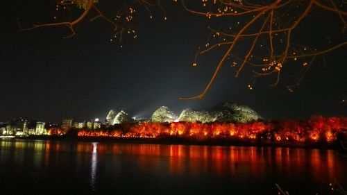 View of illuminated city at night