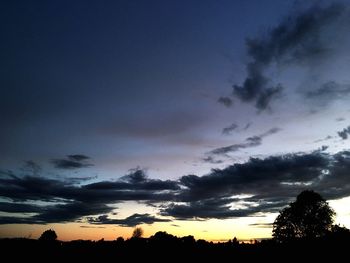 Low angle view of dramatic sky during sunset