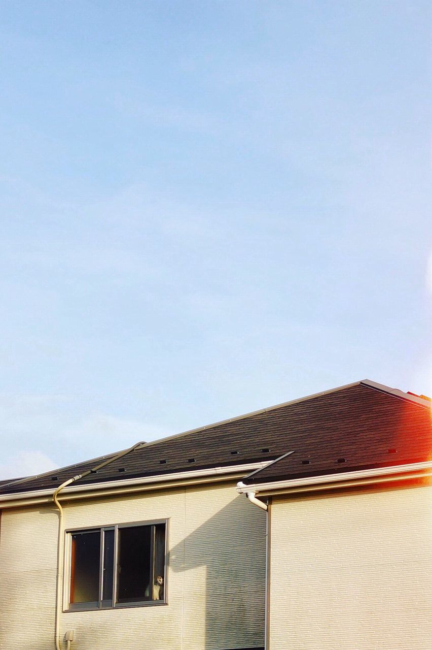 LOW ANGLE VIEW OF HOUSE AGAINST CLEAR SKY