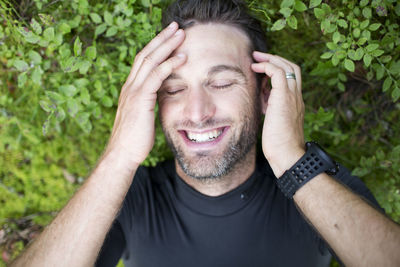 Tired runner in forest