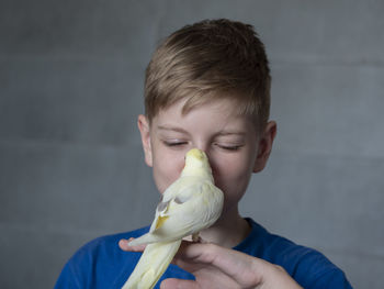 Portrait of boy eating food