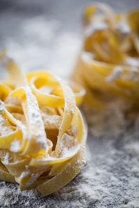 Close-up of yellow fries on table