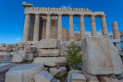 Marbles and columns of the southern side of the parthenon in the acropolis, athens, greece