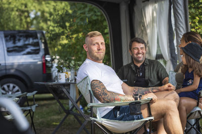 Man relaxing at camping site