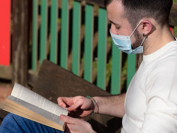 Portrait of man working on wood