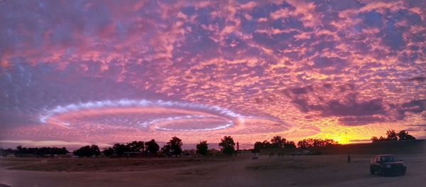Scenic view of landscape at sunset