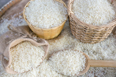 High angle view of rice spilling on table