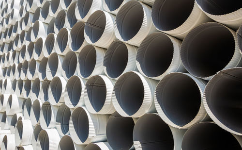 Downpipe warehouse. steel pipes, parts for the construction of a roof drainage system in a warehouse