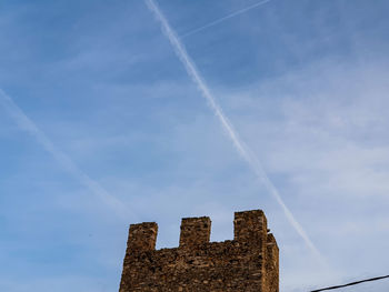 Low angle view of vapor trail in sky