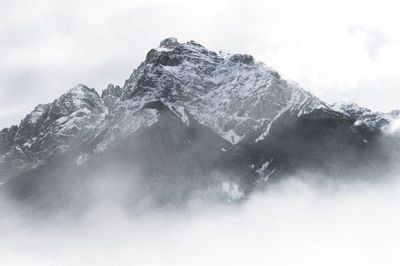 Scenic view of snow covered mountains