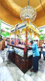 Rear view of people at amusement park