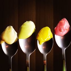 Low angle view of multi colored candies in plate