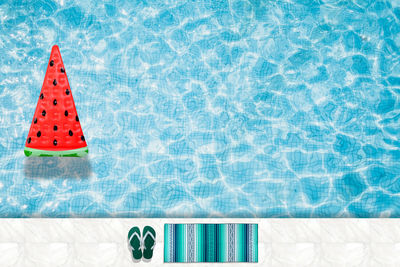 High angle view of plastic floating on swimming pool