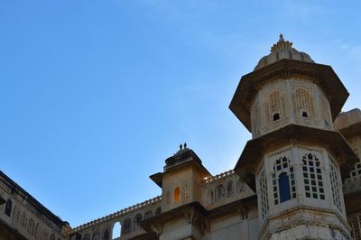 Low angle view of clock tower against sky