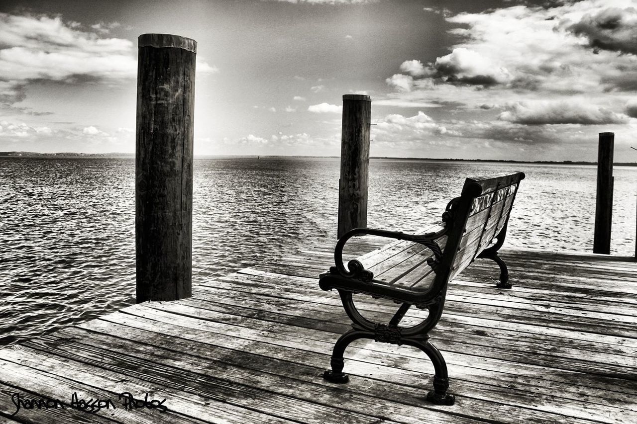 sea, sky, horizon over water, water, beach, cloud - sky, tranquility, tranquil scene, pier, wood - material, scenics, empty, nature, absence, beauty in nature, railing, bench, cloud, shore, sunlight