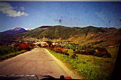 Country road passing through landscape