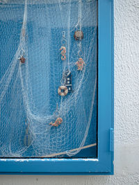 Full frame shot of blue window on wall