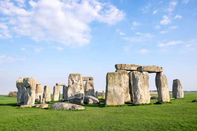 View of natural landmark on field against sky