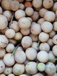 Full frame shot of onions for sale in market