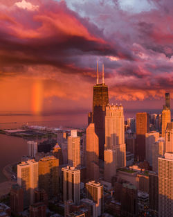 Cityscape against sky during sunset