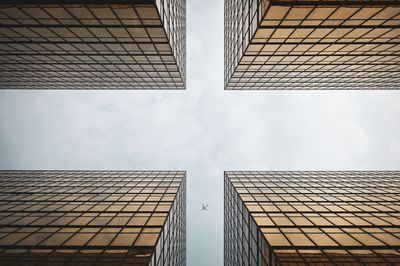 Low angle view of skyscraper against sky