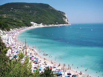 Aerial view of people enjoying vacation at beach