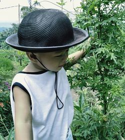 Rear view of man wearing hat