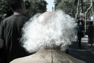 Close-up of woman covering face